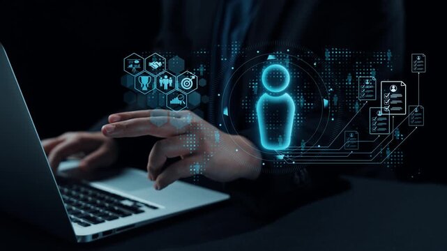 A close-up of hands working on a modern laptop, showing an updating progress bar along with various technology icons in a dark setting, symbolizing software updates. Qubit