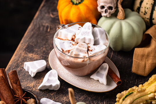 Halloween hot chocolate or cocoa with marshmallow in shape of ghost