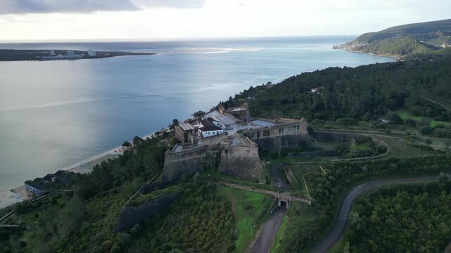 Aerial view of the historic Forte de Sao Filipe fortress overlooking the Sado River estuary and the coastline of Setubal, Setubal, Portugal.