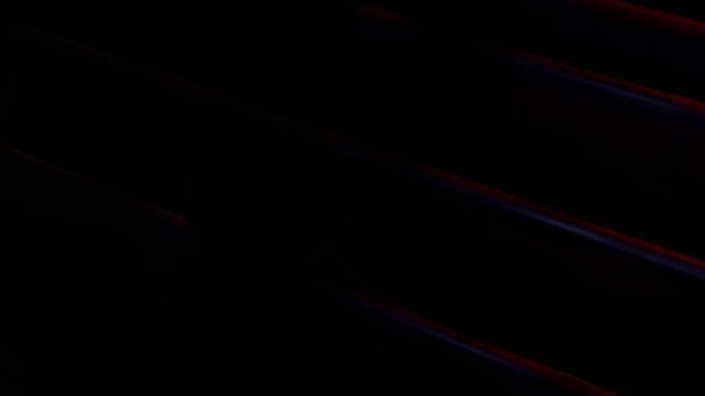 Red Blue Abstract Motion Graphics Glowing Lines on Black Background Dynamic light trails for futuristic tech themes data flow or cinematic elegance