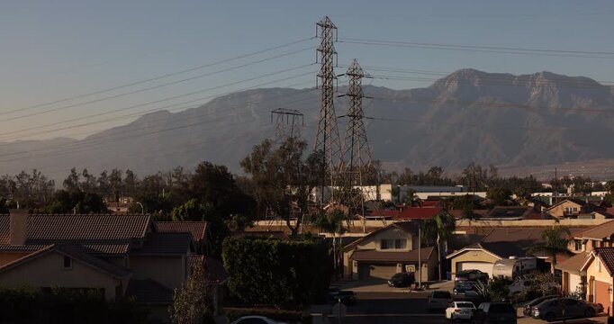 Afternoon sun shines on single family homes in the Declezville neighborhood of Fontana, California, USA.