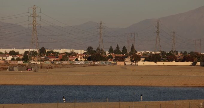 Fontana, California, USA - November 9, 2024: Water stands in a recharge basin in the Declezville neighborhood.