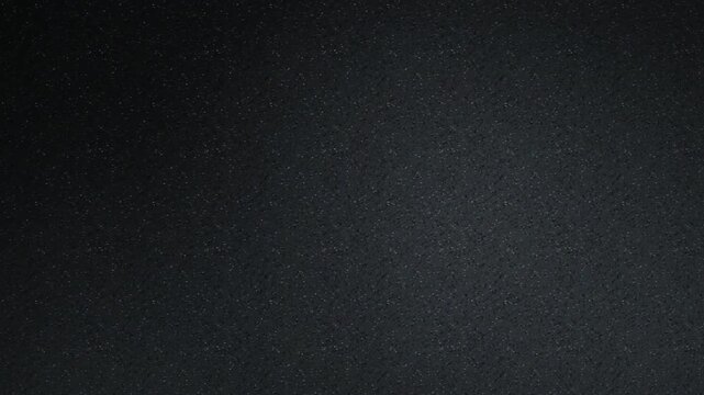 Dark asphalt texture seamless loop motion background