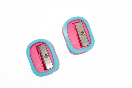 Pair of colorful pencil sharpeners isolated on white