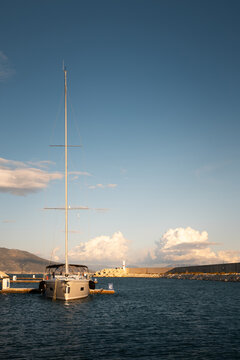 yachts docked in modern marina with shore power and water pedestals