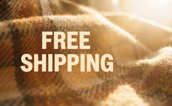 Free shipping concept with warm cozy plaid blanket background for online shopping and retail ecommerce business promotion banner