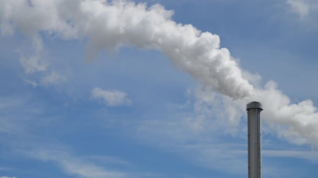 huge white and dence smoke from chimney