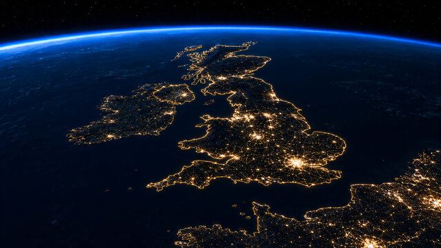 United Kingdom at night from space with glowing city lights and coastline, ideal for geography, travel, technology and European communication concepts.