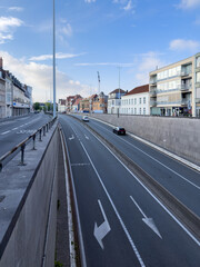 Naklejka premium Modern city avenue with road markings in Bruges Belgium