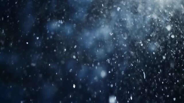 Beautiful Snow Falling Against Dark Blurred Winter Night Background, Seamless Loop of Snowflakes in Soft Light
