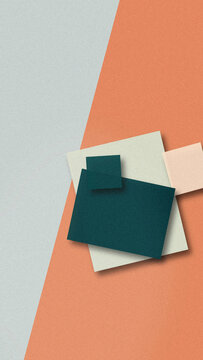 Multiple blank square cards in muted teal, blue, tan, and white float on a soft gray field, creating a calm, creative mood for templates.