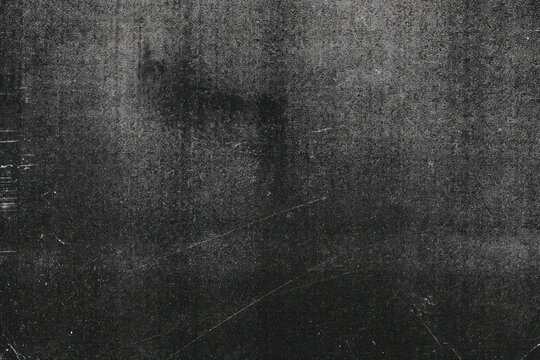 Photocopier scanner texture with Dense dark monochrome noise and gritty film grain surface texture with gritty background black white distressed surface monochrome grunge overlay effect with scratch