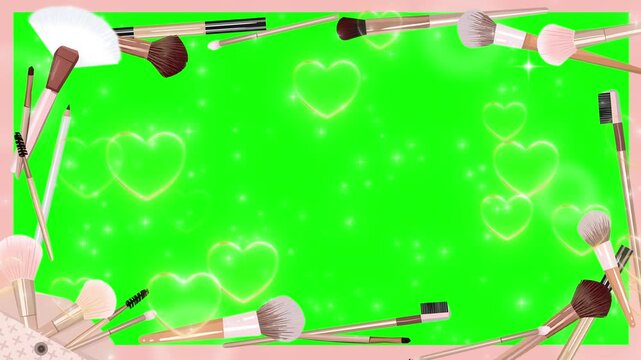 Makeup brushes arranged as a decorative border frame a vibrant green screen area filled with glowing heart icons and soft sparkling light effects suitable for beauty related video content production.