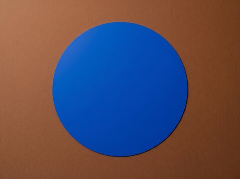 Minimalist blue circle centered on a brown paper background