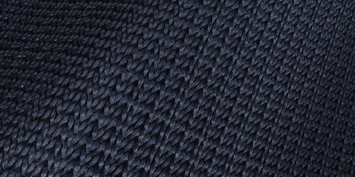 Dark navy blue braided rope weave texture dark indigo woven yarn pattern dense knitted textile surface close up heavy duty fabric full frame background design