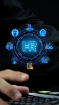 Businessman typing on calculator vertical shot with glowing circular mechanism displaying central HR text. Human resources workforce management, talent recruitment, and personnel payroll concept.