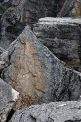 Pile of Travertine rock boulders, pointed and block shapes, pattern and texture nature background, Yellowstone National Park  © knelson20
