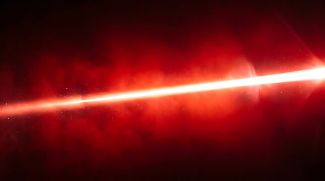 Powerful red laser beam cutting through smoke and fog in dark space with lens flare effect