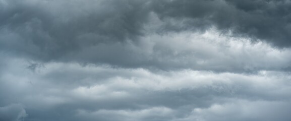 Fototapeta premium dark clouds sky Heavy rain thunderstorm. Pattern clouds overcast tornado Hurricane cyclone typhoon storm and rainy. Dark sky cloudy have storm lightning thunderbolt. Hole in black Dramatic Clouds