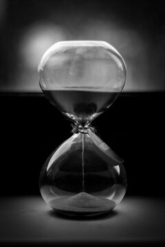 hourglass on black