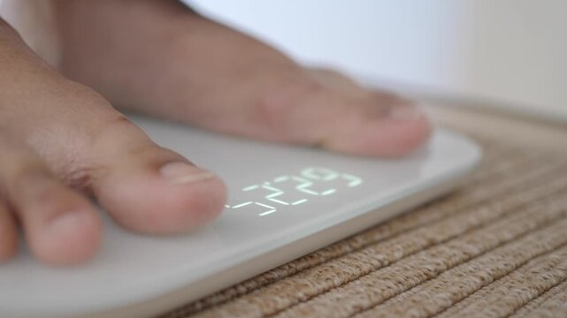 Taking weight measurement on a scale at home