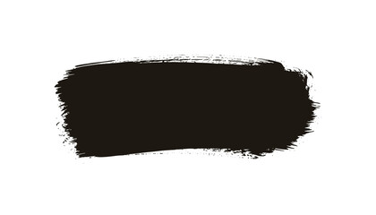 Fototapeta premium Thick black brush stroke of paint or ink on a plain white background, perfect for artistic and grunge design projects.