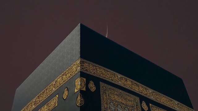 The Ramadan Crescent rises in the Kaaba. Kaaba at Masjid al Haram in Mecca with golden Arabic calligraphy Holy Kaaba in Mecca featuring the black Kiswah Close up view of the Holy Kaaba 