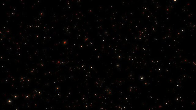 Glowing fire sparks and burning embers floating against a dark transparent background.
