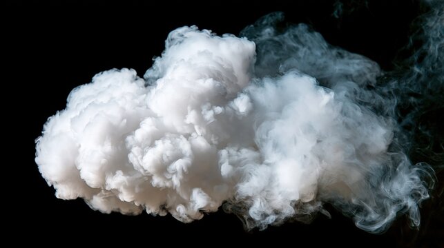 thick white smoke cloud rising against black background