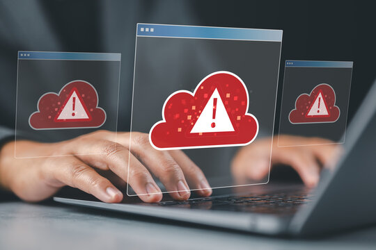 Cloud outage. Incident within cloud infrastructure. Application service unavailable. Businessperson using laptop computer.