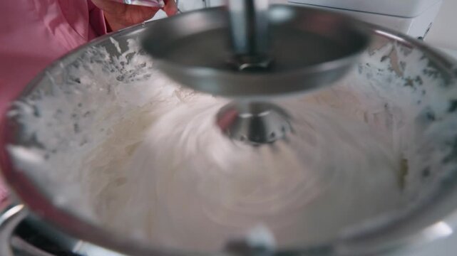 Adding pink food coloring to meringue for French macarons