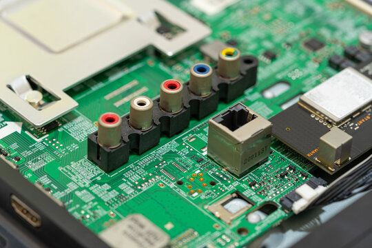 Green circuit board with AV RCA connectors and ethernet port macro