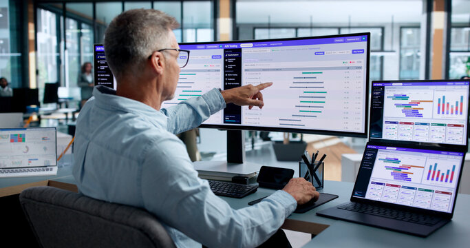 Product Manager Studies A B Test Data On Laptop