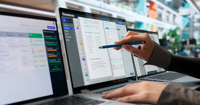 Young Woman Focused On Organizing Business Files