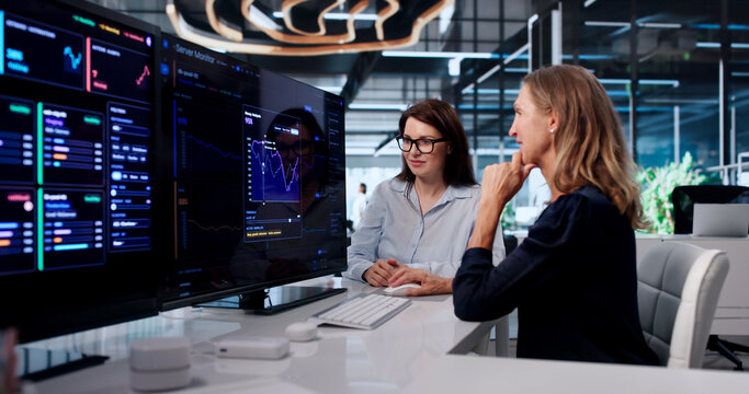 Two IT Professionals Tracking Network Data
