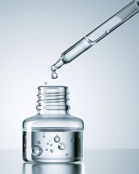 Clear glass dropper bottle transparent liquid pipette skincare cosmetic serum minimal clean modern reflective surface
