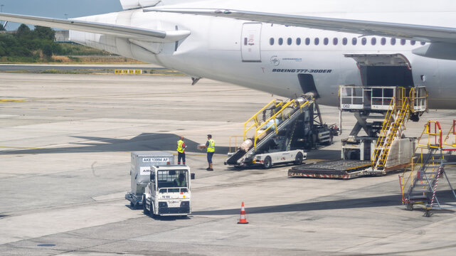 PARIS, FRANCE - JULY 13, 2026: Ground handling crews service an Air France Boeing 777-300ER aircraft at Paris Charles de Gaulle Airport