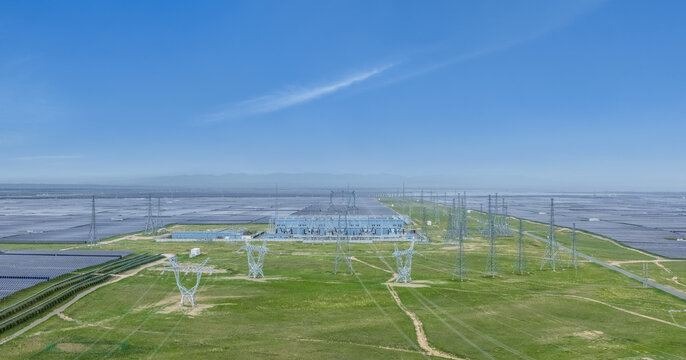 Solar Power Plant with Transmission Infrastructure in Green Field on Plateau Terrain