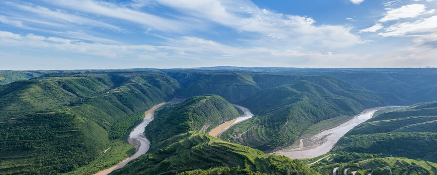 Winding River Meandering Through Green Mountain Valley