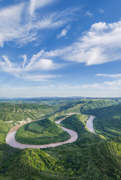 Horseshoe Bend River Meandering Through Green Hills