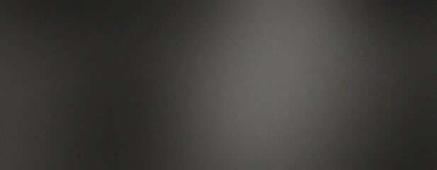 Naklejka premium Charcoal black gradient with subtle gray haze and fine grain, dark atmospheric metallic backdrop