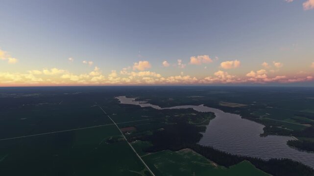 Circular aerial drone shot at sunset of Mississippi River. United States