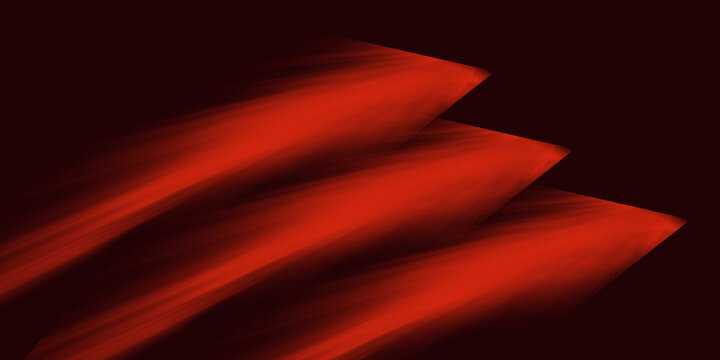 Abstract red arrow shapes with dynamic motion effect on dark background