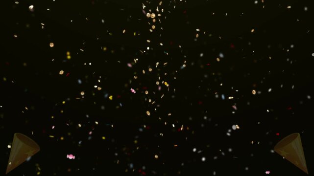 Golden glitter particles cascade downwards against a dark, featureless background, creating a festive and celebratory atmosphere with soft bokeh effects and subtle light reflections from below.