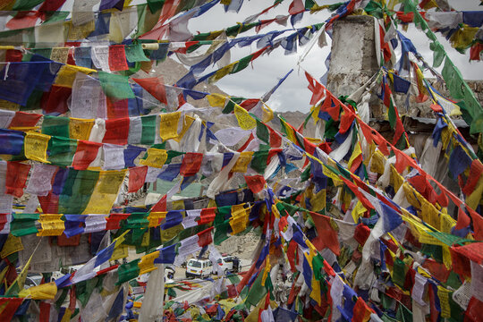 Colorful Buddhist prayer flags at Khardung La Pass in Ladakh India