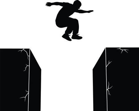 Person jumping over gap between two cracked walls with leap of faith challenge silhouette