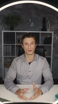 POV of confident young man recording social media content, business video blog