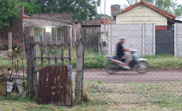 Cyclist Passing Through a Neighborhood