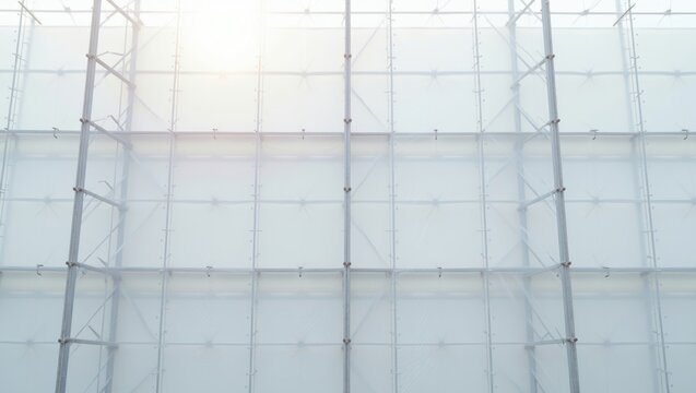 Contemporary architectural facade featuring a bright, abstract grid pattern, emphasizing transparency, structure, and minimalist design