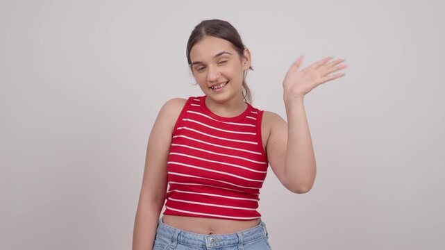 Indian Teenage Girl Waving Hello